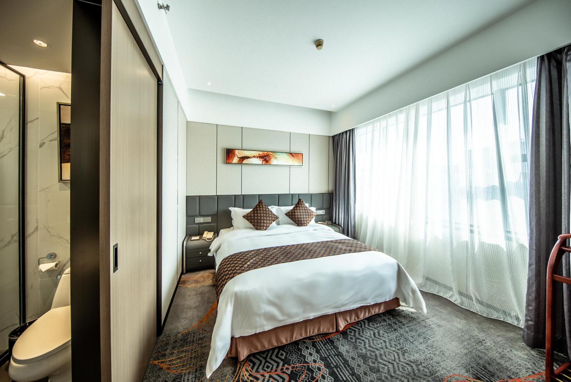 Romanjoy International Hotel Σενζέν Εξωτερικό φωτογραφία
